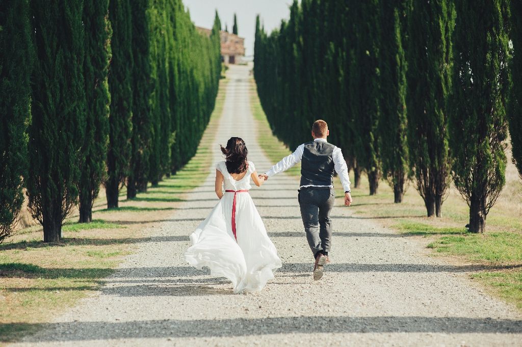 Happy,Stylish,Smiling,Couple,Walking,In,Tuscany,,Italy,On,Their Happy,Stylish,Smiling,Couple,Walking,In,Tuscany,,Italy,On,Their