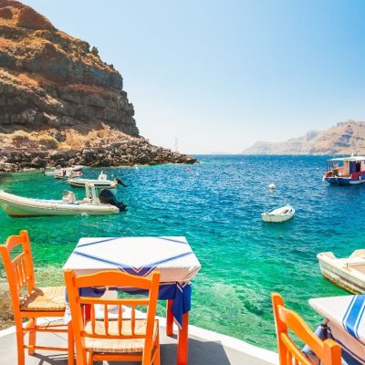 Cafe,On,The,Sea,Coast,In,The,Port,Of,Santorini