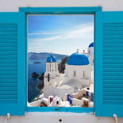 Window,With,View,Of,Caldera,And,Classical,Church,With,Blue