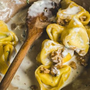Tortelloni,(typical,Bologna,Homemade,Stuffed,Pasta),With,Nuts,,Cream,And
